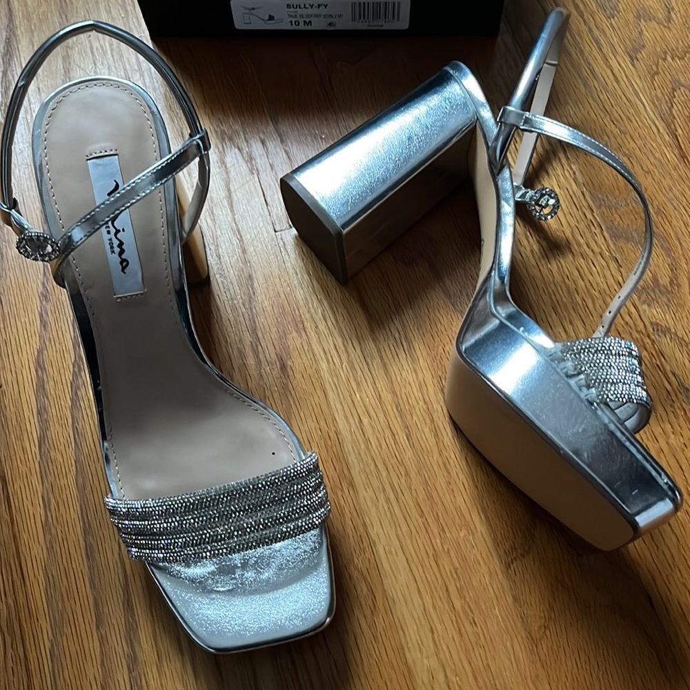 Silver shoes , never worn